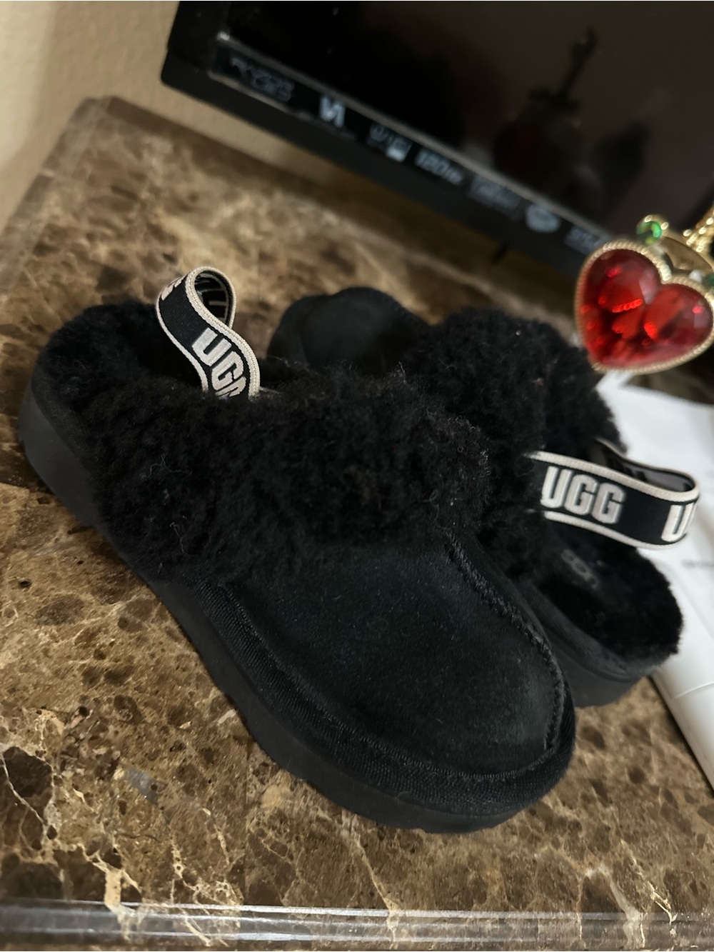 UGG Kids Black Fuzz Slide Slippers with Logo Heel Strap